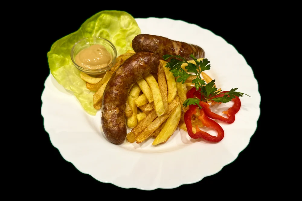 Homemade sausages with French fries